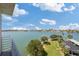 Expansive water view overlooking lush green space, parking, and gorgeous blue skies at 7912 Sailboat Key S Blvd # 508, South Pasadena, FL 33707