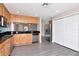 Updated kitchen with stainless steel appliances and a view of the adjacent living spaces at 8561 Deer Chase Dr, Riverview, FL 33578