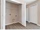 Empty laundry room with shelving and hookups, ready for appliances at 8561 Deer Chase Dr, Riverview, FL 33578