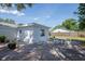 Backyard featuring a patio area for outdoor seating at 9118 108Th Ave, Seminole, FL 33777