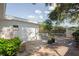 Spacious backyard featuring a brick patio and lush landscaping at 9118 108Th Ave, Seminole, FL 33777