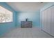 Bright bedroom with a large window and plenty of closet space at 9118 108Th Ave, Seminole, FL 33777