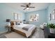 Cozy bedroom featuring natural light, ceiling fan, and stylish decor at 9118 108Th Ave, Seminole, FL 33777