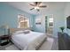 Beautiful main bedroom featuring a ceiling fan, with an attached bathroom at 9118 108Th Ave, Seminole, FL 33777