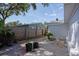 Backyard patio area with potted plants and a privacy fence at 9118 108Th Ave, Seminole, FL 33777