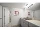 Bathroom vanity with ample counter space, drawers, and well-lit mirror at 919 Osceola Rd # 202, Belleair, FL 33756