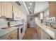 Well-maintained kitchen featuring modern appliances, bright countertops, and ample cabinet space for all your cooking needs at 919 Osceola Rd # 202, Belleair, FL 33756