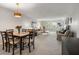 Inviting living space featuring a dining area, comfortable seating, and ample natural light, perfect for relaxation and entertaining at 919 Osceola Rd # 202, Belleair, FL 33756