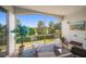 Relaxing outdoor patio with seating and a scenic view of the golf course at 919 Osceola Rd # 202, Belleair, FL 33756