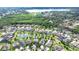 Beautiful aerial view of a residential neighborhood featuring a community pond and scenic lake at 1134 Tracey Ann Loop, Seffner, FL 33584