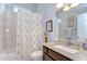 Bright bathroom featuring a shower-tub combo and vanity with granite counters at 1134 Tracey Ann Loop, Seffner, FL 33584