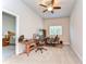 This bedroom offers a ceiling fan, plush carpet, and is perfect for a home office or guest room at 1134 Tracey Ann Loop, Seffner, FL 33584