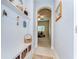 The hallway has storage and an arched entryway at 1134 Tracey Ann Loop, Seffner, FL 33584