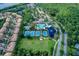 Overhead view of community amenities: pool, tennis courts, playground and landscaping at 11624 Bristol Chase Dr, Tampa, FL 33626