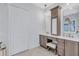 This bathroom features a double vanity, white countertop, and decorative tile wall at 11624 Bristol Chase Dr, Tampa, FL 33626
