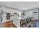 Open concept kitchen features granite countertops, stainless appliances and eat-in island at 11624 Bristol Chase Dr, Tampa, FL 33626