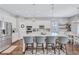 Beautiful kitchen island with stainless steel appliances and seating for four at 11624 Bristol Chase Dr, Tampa, FL 33626