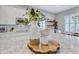 Kitchen island features granite counters, stainless appliances, and eat-in seating at 11624 Bristol Chase Dr, Tampa, FL 33626