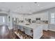 Spacious kitchen with a large center island with seating and stainless steel appliances at 11624 Bristol Chase Dr, Tampa, FL 33626