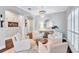 Bright living room features hardwood floors, recessed lighting and comfortable seating at 11624 Bristol Chase Dr, Tampa, FL 33626
