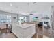 Open concept living space with hardwood floors, recessed lighting, and a fireplace at 11624 Bristol Chase Dr, Tampa, FL 33626