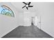 Clean and bright bedroom with built-in storage and large windows at 12062 Stone Crossing Cir, Tampa, FL 33635