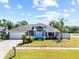 Charming single-story home with well-maintained landscaping and a welcoming facade at 12062 Stone Crossing Cir, Tampa, FL 33635