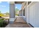 Inviting front porch with tile flooring and a view of the neighborhood at 12062 Stone Crossing Cir, Tampa, FL 33635