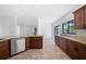 Updated kitchen featuring stainless steel appliances, granite countertops and view of the dining area at 12062 Stone Crossing Cir, Tampa, FL 33635