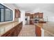 Modern kitchen with stainless steel appliances, ample cabinet space, and stylish mosaic backsplash at 12062 Stone Crossing Cir, Tampa, FL 33635