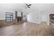 Bright living room features a stone fireplace, wood-look flooring and lots of natural light at 12062 Stone Crossing Cir, Tampa, FL 33635