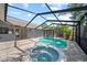 Screened-in pool and spa area for year-round enjoyment and entertainment near the house at 12062 Stone Crossing Cir, Tampa, FL 33635