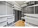 Organized walk-in closet with adjustable shelving and ample storage space at 12062 Stone Crossing Cir, Tampa, FL 33635