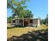 Charming single story home featuring a covered front porch and landscaped yard at 12403 Tocci Ln, Riverview, FL 33579