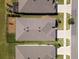 This aerial view displays the house's roof, the green lawn, and the layout of the neighborhood at 13227 Waterleaf Garden Cir, Riverview, FL 33579