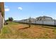 Enjoy this expansive fenced backyard with a lush lawn at 13227 Waterleaf Garden Cir, Riverview, FL 33579