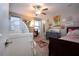 Bright bedroom featuring a crib, multiple windows, and decor at 13651 Ashlar Slate Pl, Riverview, FL 33579
