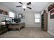 Bedroom featuring neutral carpet and a desk area at 13651 Ashlar Slate Pl, Riverview, FL 33579