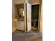 Bathroom featuring a vanity with white cabinets, sink, and toilet at 1379 Pine St, Clearwater, FL 33756