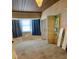 Sunlit bedroom with a unique window and a decorative ceiling at 1379 Pine St, Clearwater, FL 33756