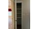 A bedroom closet provides ample storage with multiple shelves at 1379 Pine St, Clearwater, FL 33756