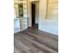 Bright living room with custom built-in shelving and elegant flooring at 1379 Pine St, Clearwater, FL 33756