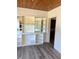 Bright living room featuring custom built-in shelving and elegant flooring at 1379 Pine St, Clearwater, FL 33756