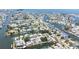 Wide aerial shot displays dense waterfront residential area with canals leading to open bay waters at 13926 Helen Ave, Hudson, FL 34667
