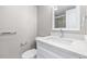 Updated bathroom with modern vanity, quartz countertop, and chrome fixtures at 13926 Helen Ave, Hudson, FL 34667
