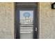 Condominium door with beach sign at 14900 Gulf Blvd # 212, Madeira Beach, FL 33708
