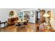 Relax in this living room with hardwood floors, formal dining and fully-equipped kitchen at 14900 Gulf Blvd # 212, Madeira Beach, FL 33708