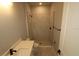 Stylish bathroom featuring a tiled shower and modern vanity at 1631 Springwell Ln, Sarasota, FL 34240