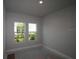Bright bedroom with a neutral color scheme at 1631 Springwell Ln, Sarasota, FL 34240