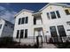 Inviting two-story home with a charming entrance and well-kept landscaping at 1631 Springwell Ln, Sarasota, FL 34240